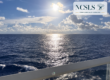 Ocean sunrise from Stephanie Merritt’s solo cruise with the NC Senior Living Solutions logo.