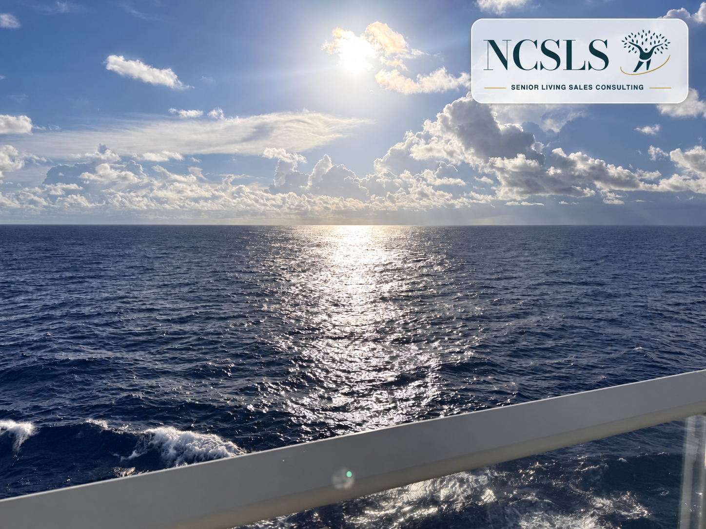 Ocean sunrise from Stephanie Merritt’s solo cruise with the NC Senior Living Solutions logo.